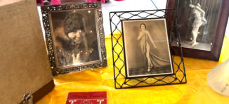 A grouping of framed Roaring Twenties portraits in decorative frames